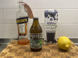 Witbier, Aperol, lemon, blueberry juice